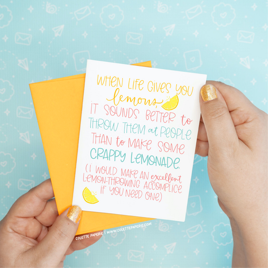 Throwing Lemons Greeting Card